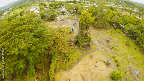 Aerial views the ruins of Cagsawa church, showing Mount Mayon erupting in the background. Cagsawa church. Philippines. photo