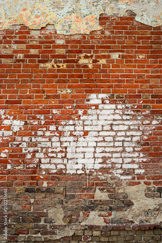 Aged street wall background, texture with spot of white paint