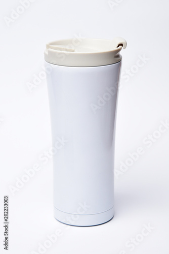 Thermos bottle on a white background, copy space mock up.