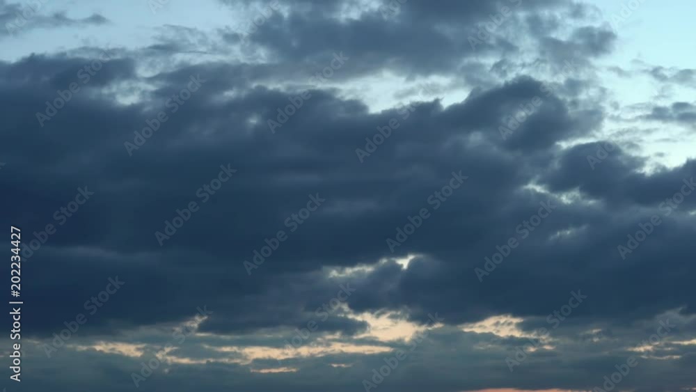flying dark clouds in the sky. evening sky before the rain flying dark clouds in the sky. evening sky before the rain