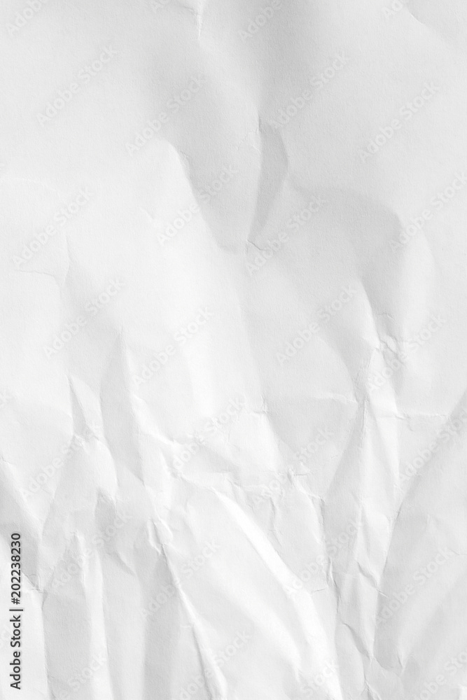 The background is white. Texture of paper with kinks and dents, old and dilapidated. The background is white. Texture of paper with kinks and dents, old and dilapidated.