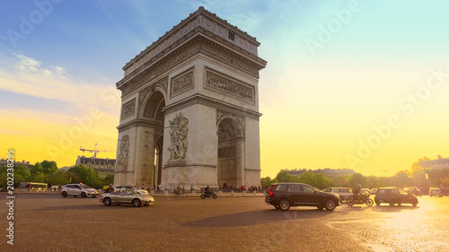 Paris, France - 5 May, 2017: Sunset in Paris city with famous Arch de Triumph traffic circle panorama © zefart
