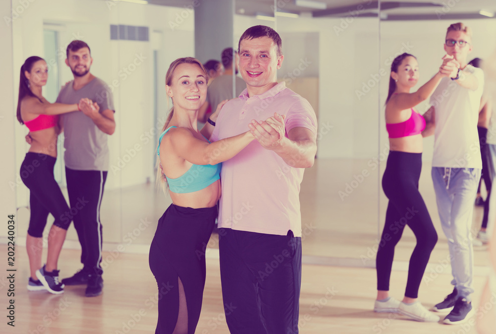 Obraz premium Smiling dancing pair dance waltz together