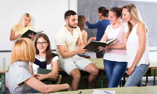 Chilling college students in classroom