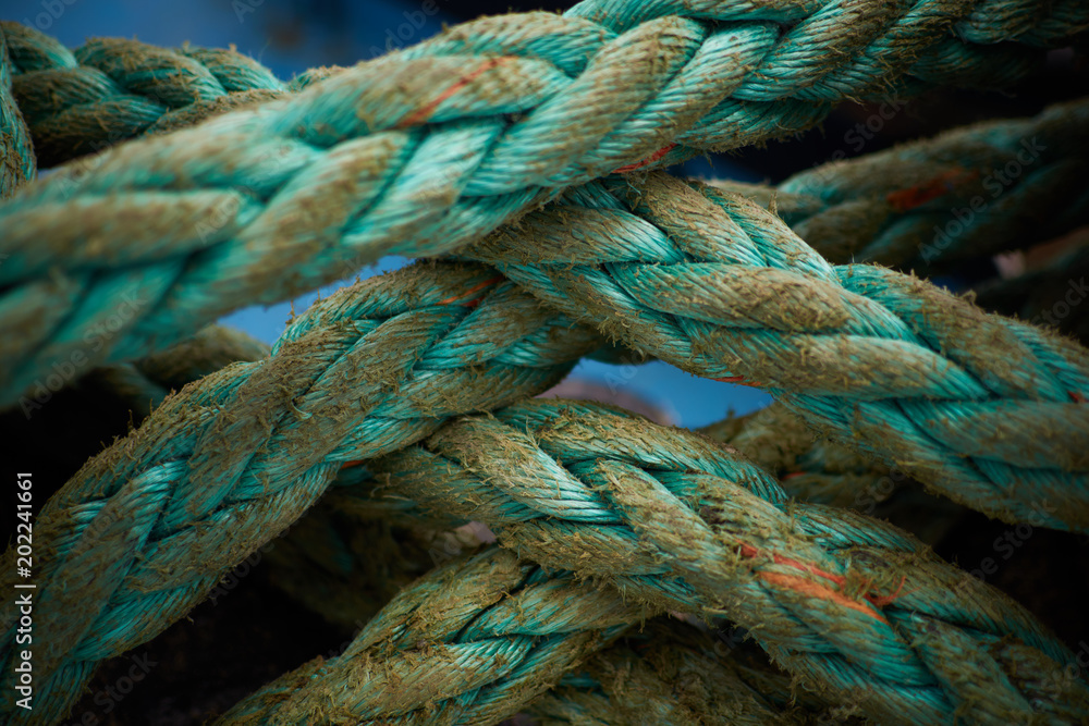 Ship’s mooring green rope