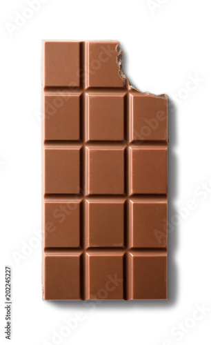 Top view of bitten milk chocolate bar. Isolated on white background