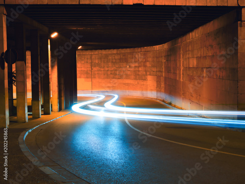 Fototapeta Naklejka Na Ścianę i Meble -  Blue and Orange car lights long exposure