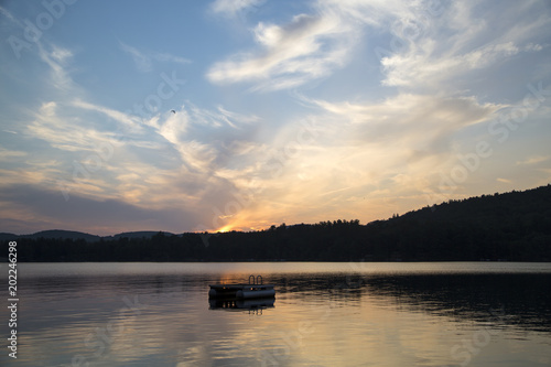 Metal swim platform, Squam Lake, New Hampshire, at sunset © krw14