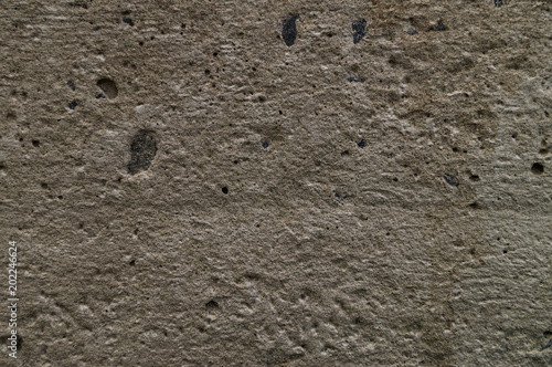 Texture of a concrete flat surface made of cement  sands and crushed stone.