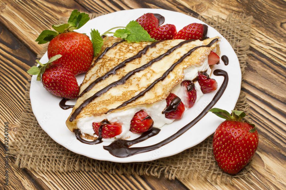 Crepes with Banana and strawberries Crepes with Banana and strawberries