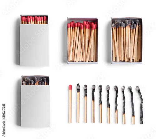 Set of match boxes and matchsticks isolated on white background photo