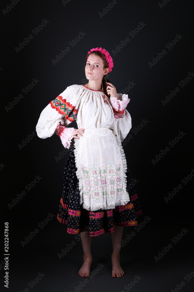 Young beautiful slovak woman in traditional costume Young beautiful slovak woman in traditional costume
