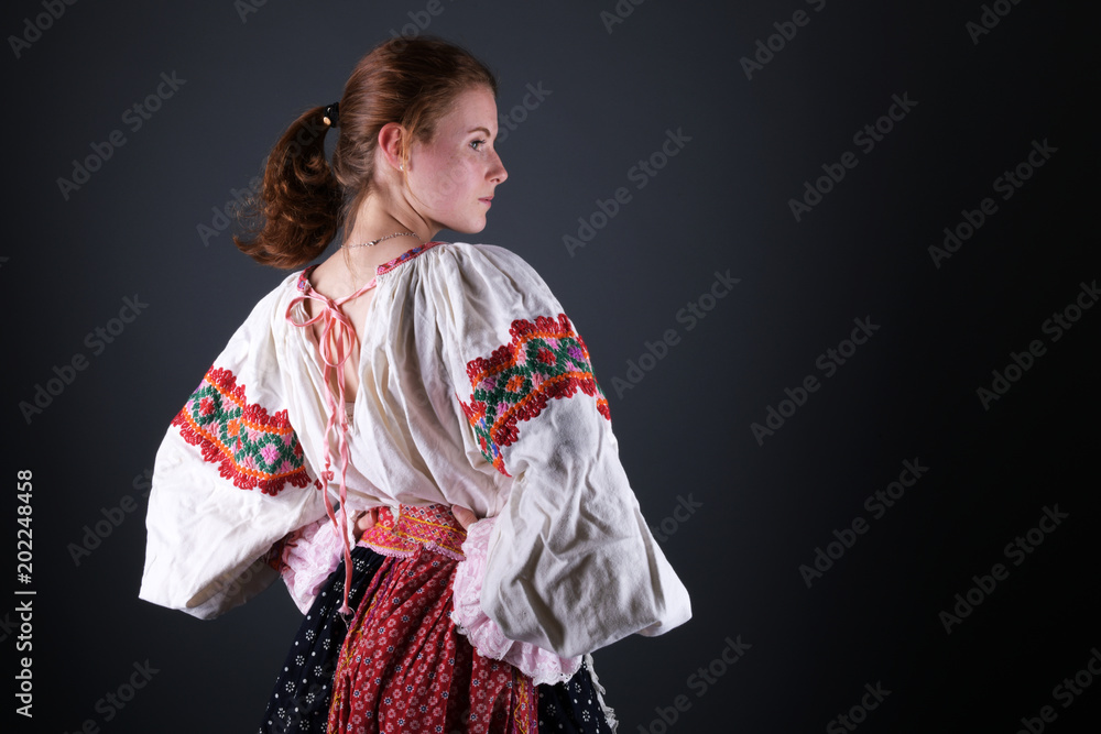 Young beautiful slovak woman in traditional costume