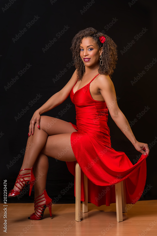 Ballerina cubana con vestito rosso Stock Photo | Adobe Stock