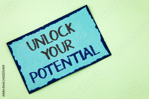 Conceptual hand writing showing Unlock Your Potential. Business photo text Reveal talent Develop abilities Show personal skills written on Sticky Note Paper on plain background.