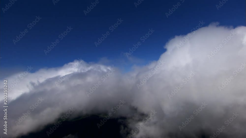 Flying through wisps above cloud mass Flying through wisps above cloud mass