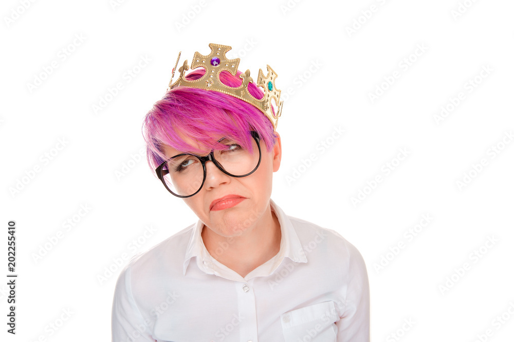 Unhappy girl in crown on white