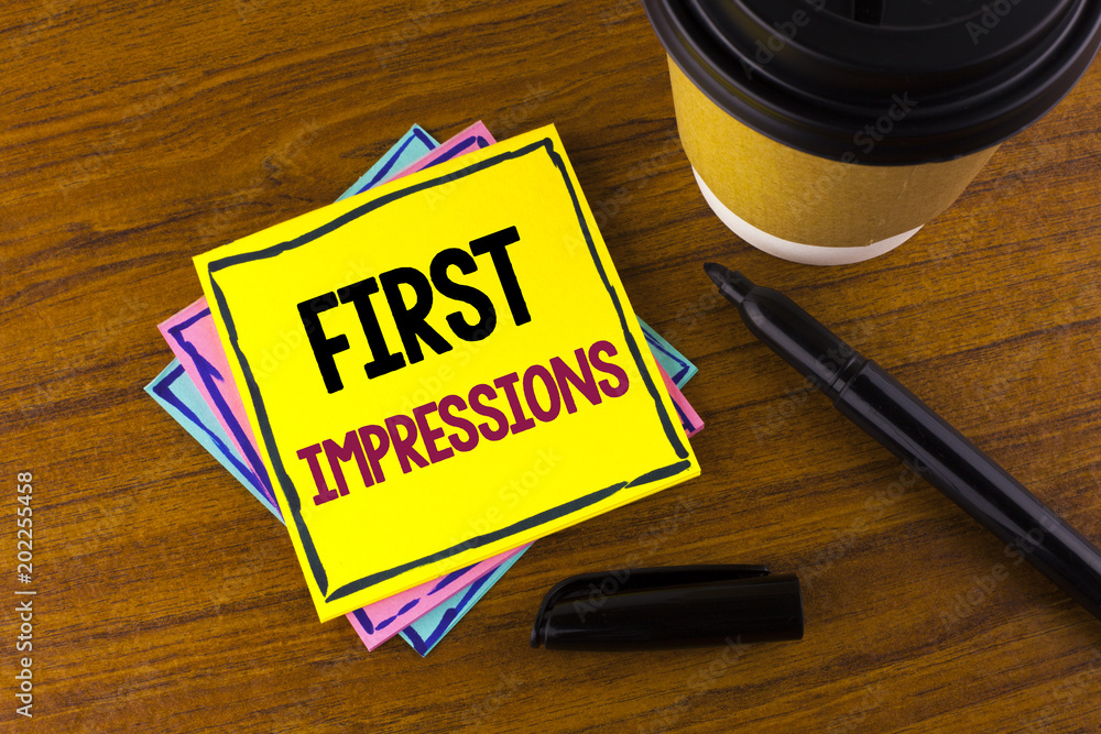 Word writing text First Impressions. Business concept for Encounter presentation performance job interview courtship written on Sticky Note Paper on wooden background Marker Cup next to it. Word writing text First Impressions. Business concept for Encounter presentation performance job interview courtship written on Sticky Note Paper on wooden background Marker Cup next to it.