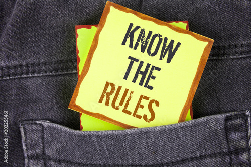 Handwriting text writing Know The Rules. Concept meaning Understand terms and conditions get legal advice from lawyers written on Sticky Note Paper placed on the Jeans background.