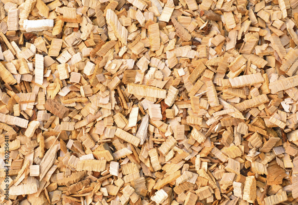 Wood chips of alder-tree for smoking or recycle. Texture for background. Wood chips of alder-tree for smoking or recycle. Texture for background.