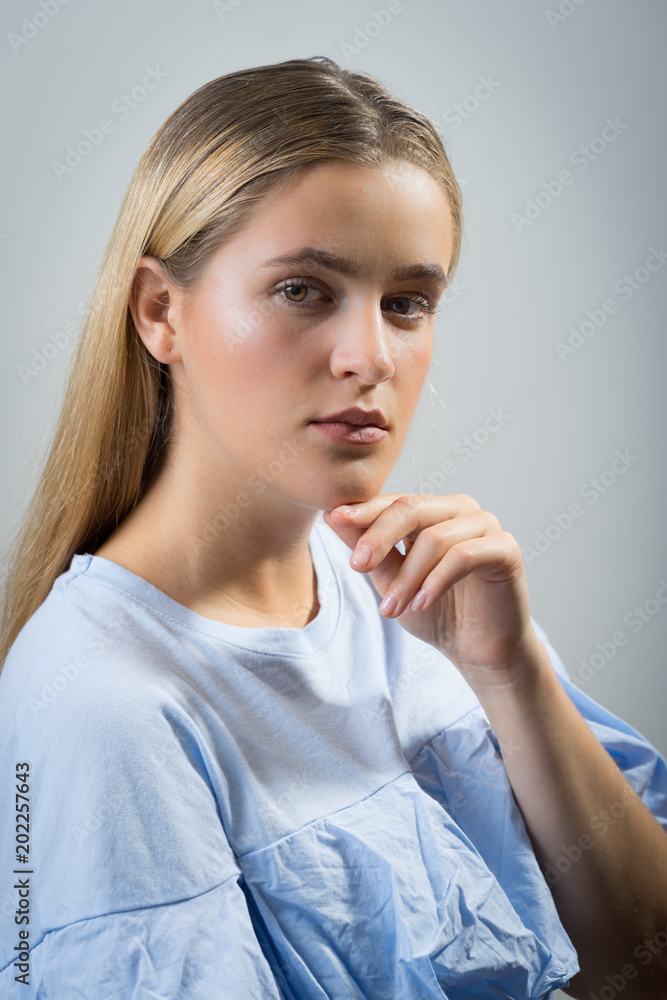 portrait of young pretty cute blonde girl. Beautiful woman posing portrait of young pretty cute blonde girl. Beautiful woman posing