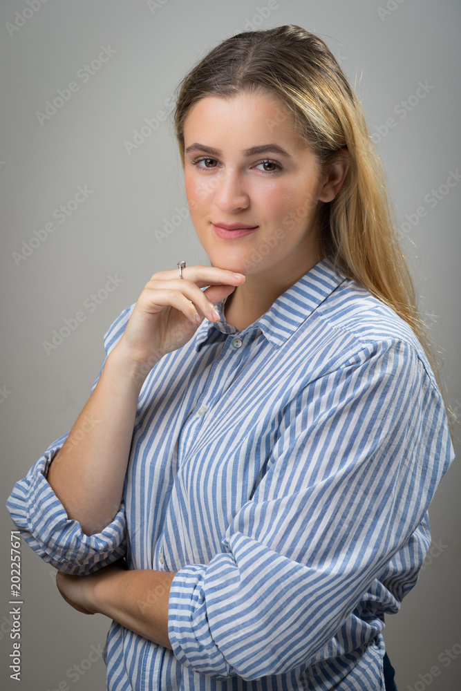 portrait of young pretty cute blonde girl. Beautiful woman posing portrait of young pretty cute blonde girl. Beautiful woman posing