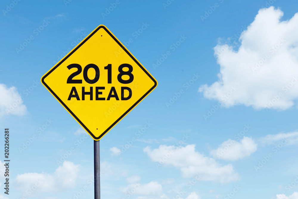 Yellow signpost with text of 2018 ahead Yellow signpost with text of 2018 ahead