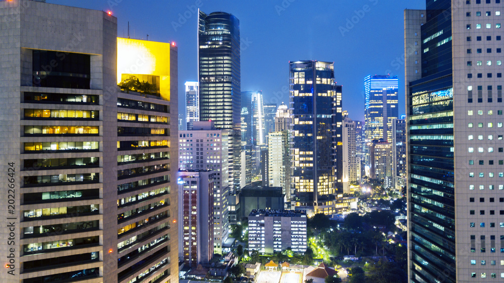 View of apartment and office buildings at night