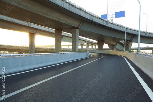 Empty road floor with city overpass viaduct bridge © Aania