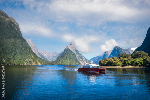 A local boat at Freshwater Basin at Milford Sound in the morning. Milford Sound is a fjord and the most beautiful natural feature of New Zealand's Southern Island.