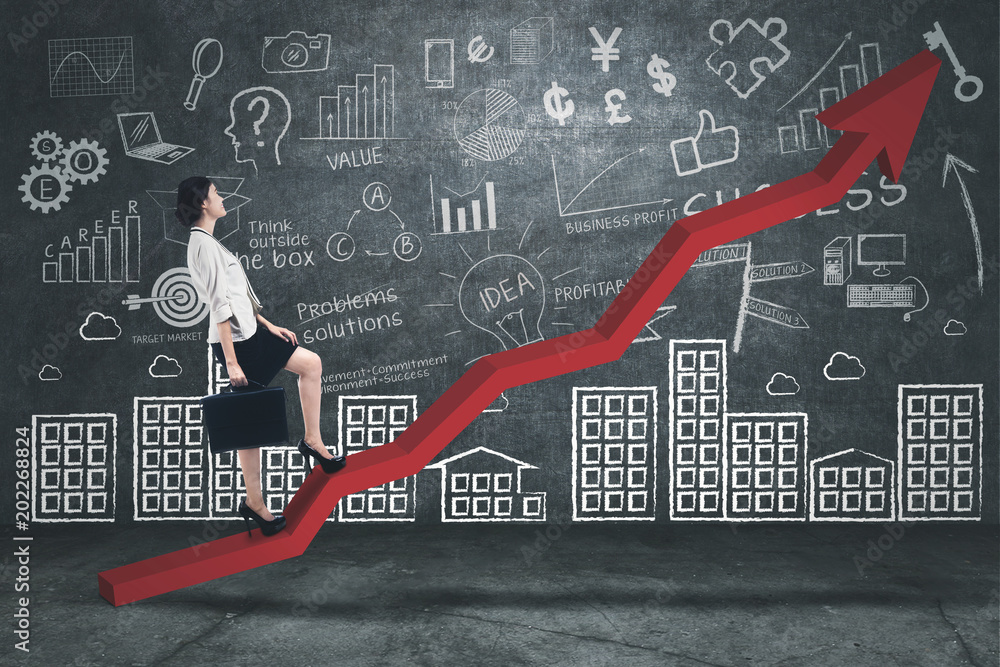 Beautiful businesswoman walks on an upward arrow Beautiful businesswoman walks on an upward arrow
