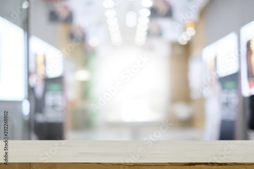 Wallpaper Mural Empty wooden table platform blur office background for presentation product. Torontodigital.ca