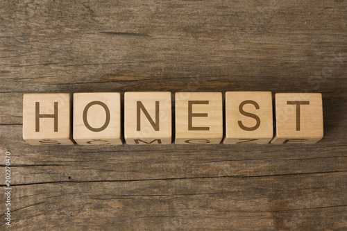 honest word written on wooden toy cubes 