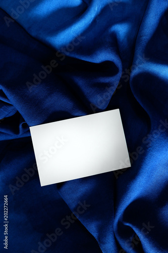 Navy blue silk and white paper. Theme for luxurious classic. Start idea for everything design