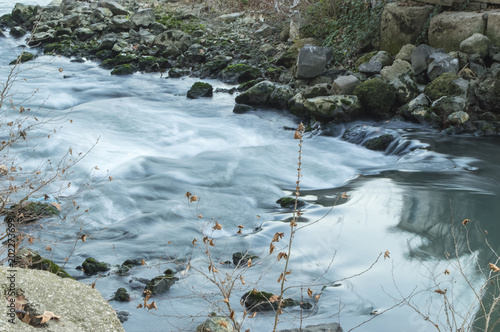 Tiber river flowing in rocky coasts