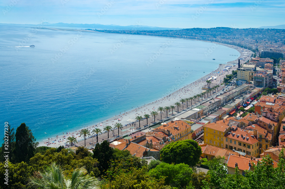 Panoramic aerial view of public beach in Nice in a beautiful summer day, France