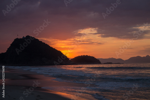 Sunrise on Copacabana beach Rio de Janeiro city with beautiful royal colors © rafaelcampezato