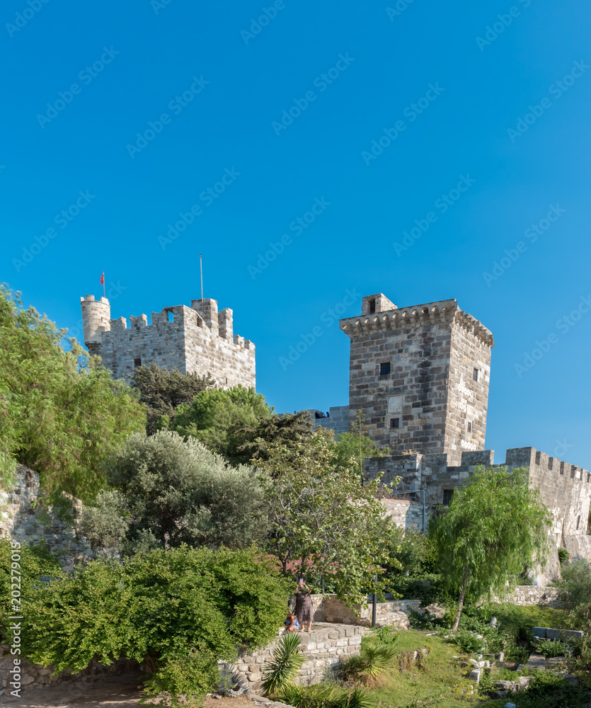 Unidentified people walk and explore in Bodrum Castle