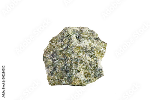 Macro shooting of natural gemstone. Raw mineral olivine. Italy. Isolated object on a white background. photo