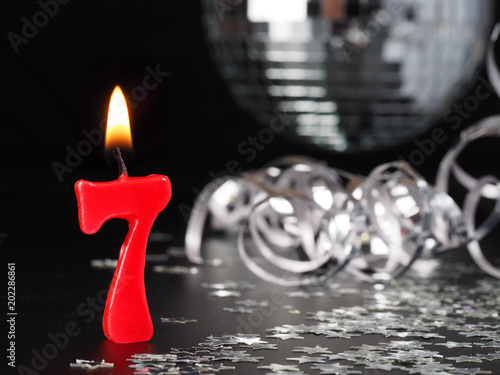 Red candles showing Nr. 7

Abstract Background for birthday or anniversary party.
