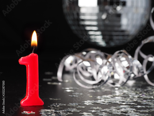 Red candles showing Nr. 1

Abstract Background for birthday or anniversary party.