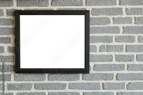 Wallpaper Mural Black natural wooden frame on bricks wall. Mock up blank poster picture frame on brick wall. Torontodigital.ca