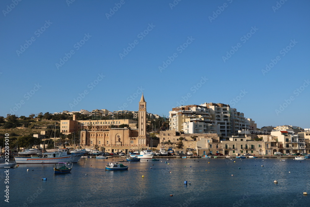 View to Church in Marsaskala at the Mediterranean Sea, Malta 