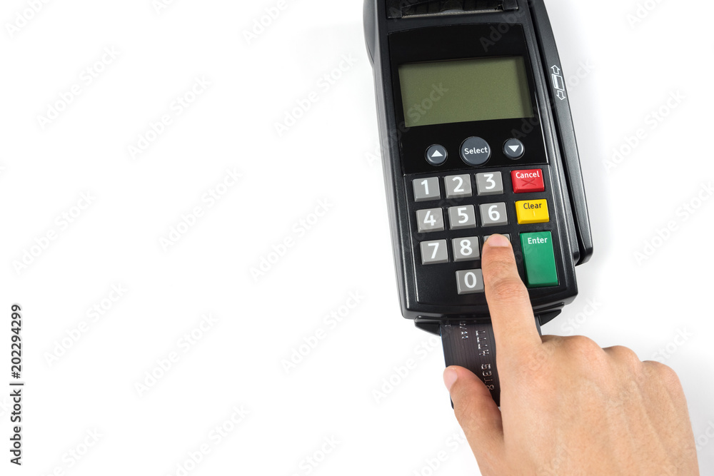 Close up man’s hand pressing pin code or number on credit card machine for payment or withdraws money isolated on white background. Close up man’s hand pressing pin code or number on credit card machine for payment or withdraws money isolated on white background.