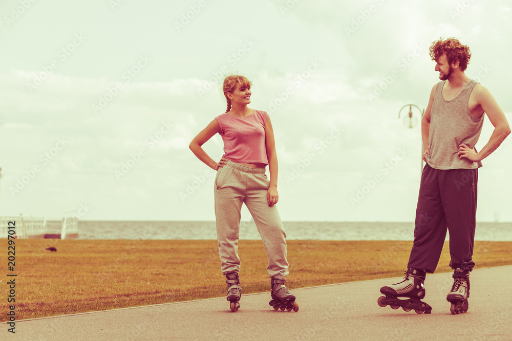 roller skater couple skating outdoor roller skater couple skating outdoor