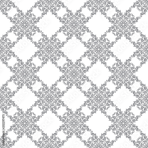 Seamless pattern with ornate Damask ornament on a white background. Design of curls and plant elements. Ideal for textile print and wallpapers.