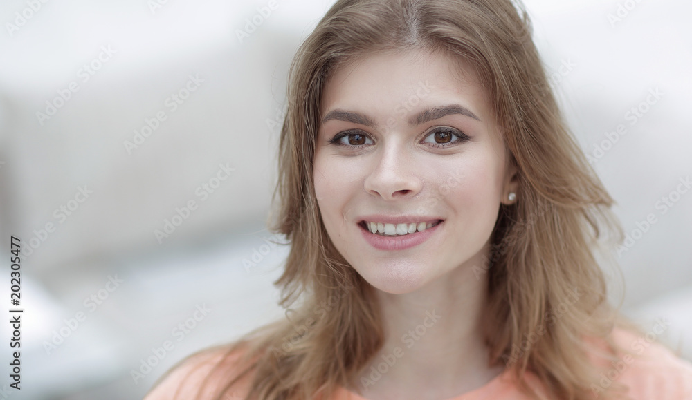 closeup portrait of a young woman on blurred background. closeup portrait of a young woman on blurred background.