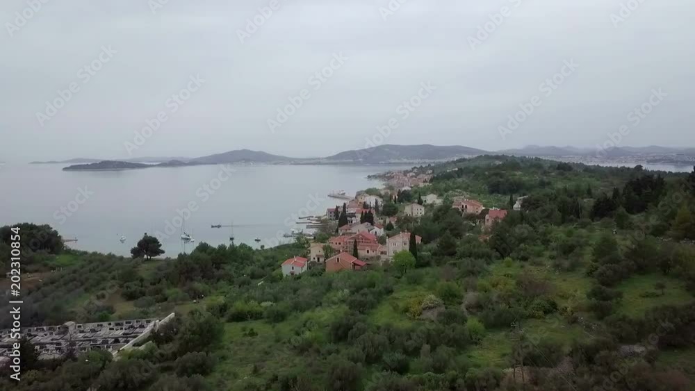 Aerial: Flying over small settlement on Croatian island Prvic in Dalmatien. Filmed on sailing trip in Adriatic sea in Croatia. Aerial: Flying over small settlement on Croatian island Prvic in Dalmatien. Filmed on sailing trip in Adriatic sea in Croatia.