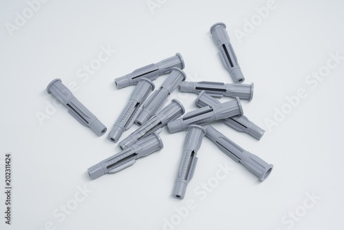 Dowels and screws on a white background