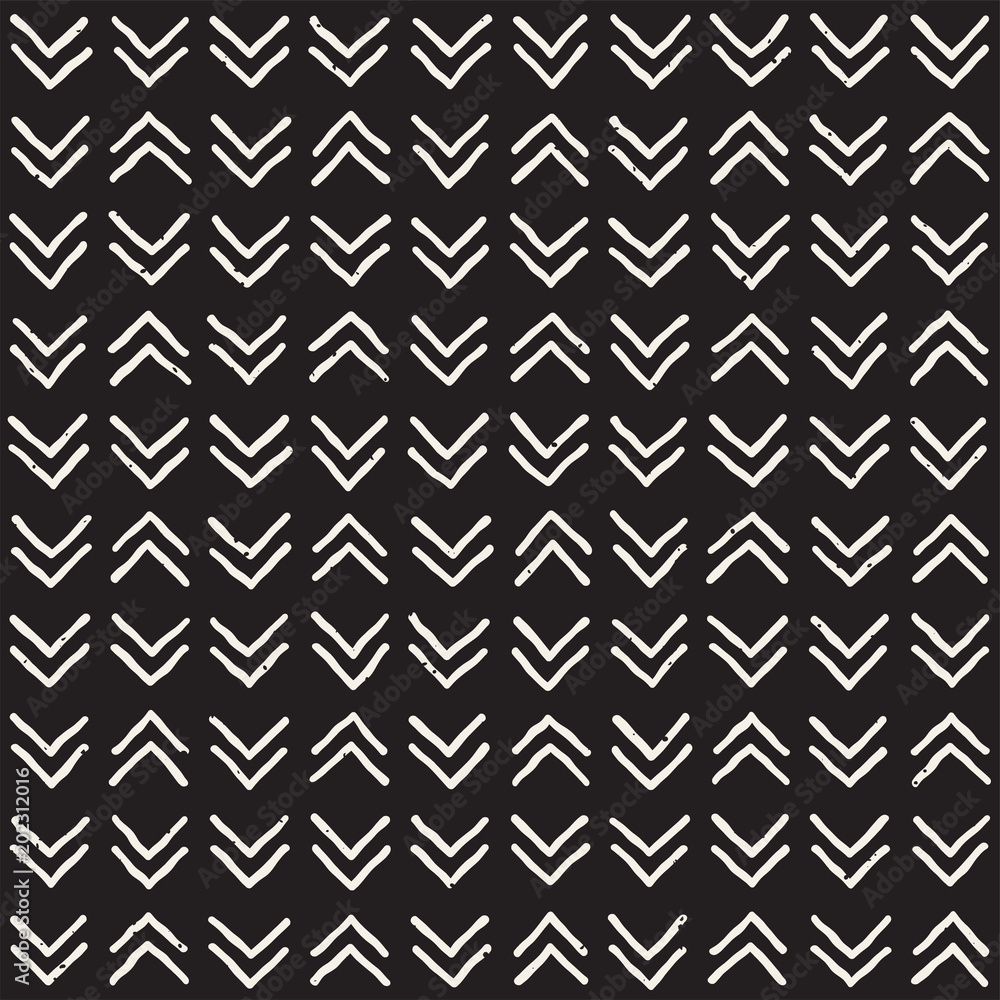 Hand drawn style ethnic seamless pattern. Abstract grungy geometric background in black and white. Hand drawn style ethnic seamless pattern. Abstract grungy geometric background in black and white.